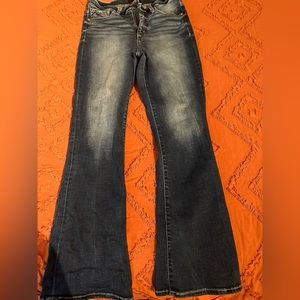 Buckle black women’s jeans